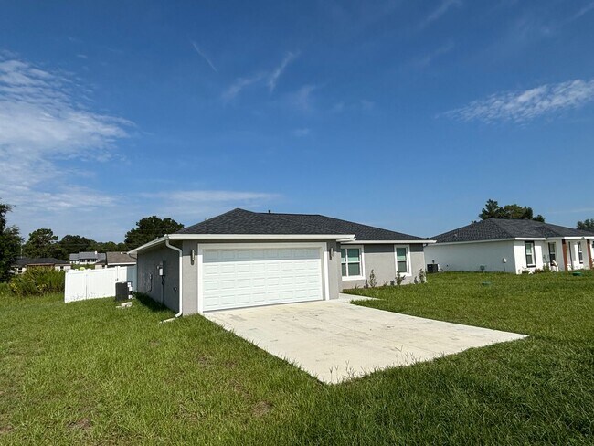 Building Photo - 2025 Newer House 3/2/2 fenced backyard. No carpet
