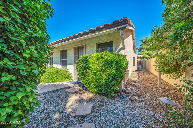 Building Photo - 5639 E Aire Libre Ave