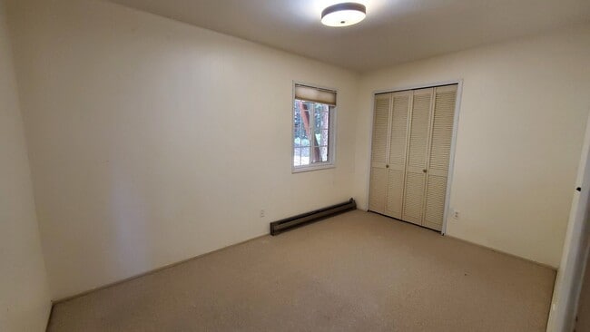 Building Photo - LONG-TERM RENTAL: Great Cedar Flat Home with Carport & Gas Fireplace!