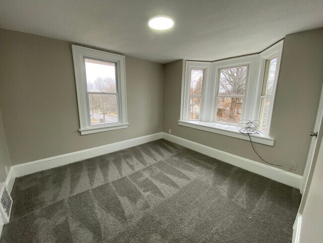 Building Photo - More Space Than You’d Expect: Updated 3BR w/ 1.5 Baths + Carpeted Attic Bonus