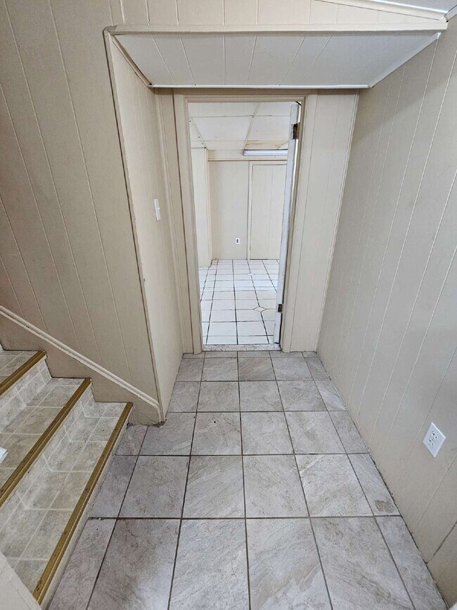 Building Photo - 3-Bedroom, 2-Bathroom Ranch with Hardwood Flooring, Tiled Kitchen and Finished Basement with a 2 ...