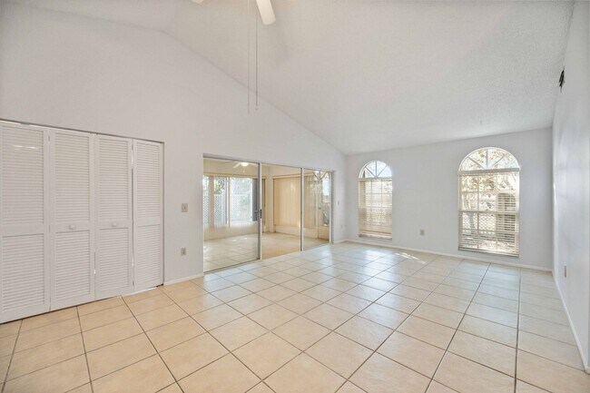 Building Photo - Beautiful Must See!! 3/2 Plus Sunroom & Garage!!  Gated Community!!