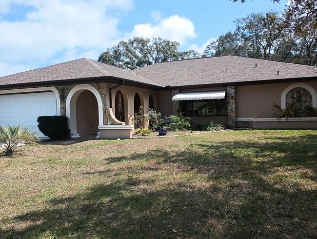 Building Photo - 3 bedroom 2 bathroom 1948 Sq ft Pool Home ...