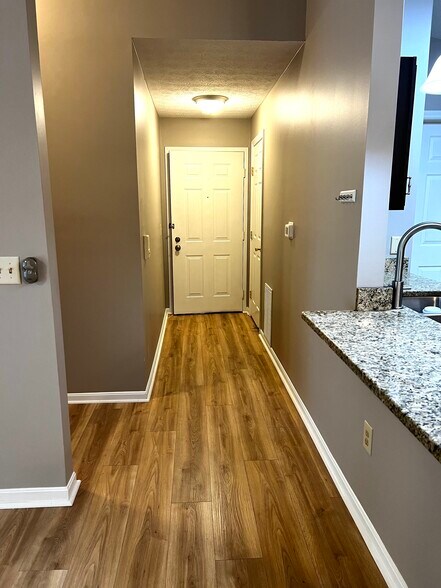 entrance hall with cost closet - 7680 Scioto Ct