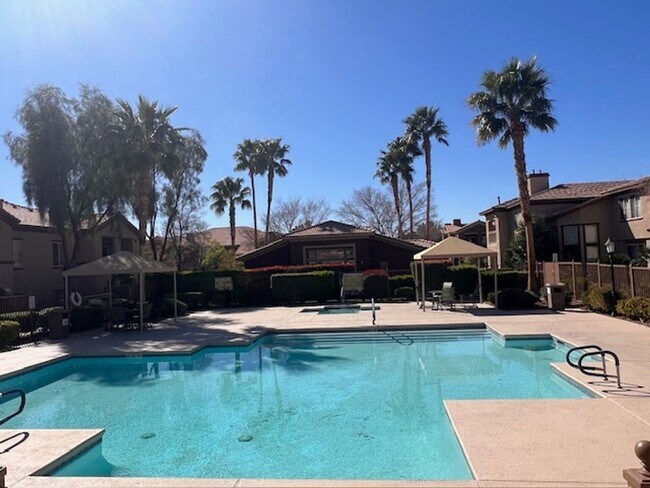 Building Photo - Gated Community / Community Pool / Luxury Vinyl Planking Throughout