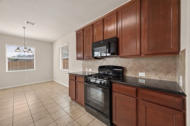 Building Photo - 9118 Cavalier Ln
