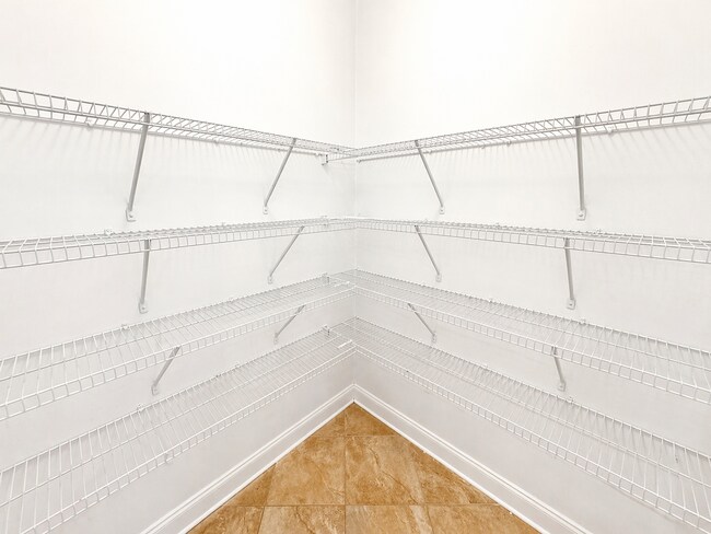 Building Photo - Clean 5 Bedroom Collins Hill Home with First Floor Suite and Oversized Master