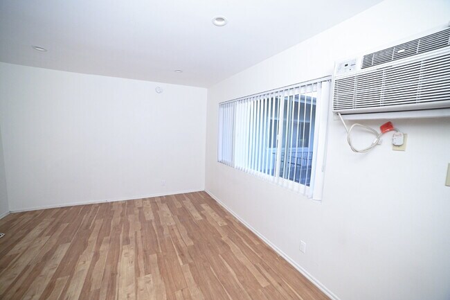 Building Photo - Newly remodeled studio in a gated building with pool and laundry room!