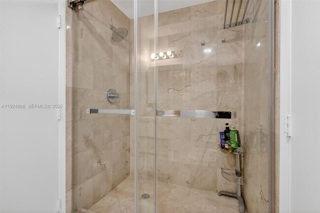 Building Photo - 10275 Collins Ave