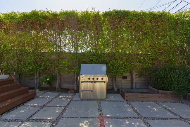 Building Photo - Spacious 4BR/3BA Westchester Home with Private Backyard, BBQ & Security System