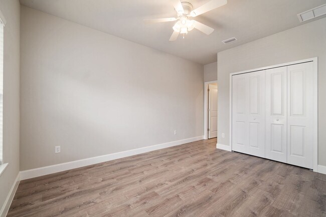 Building Photo - The Reef Townhome NOW LEASING FOR FALL 2026!