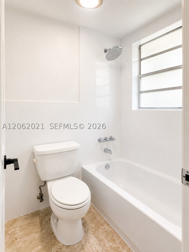 Building Photo - 6095 W 18th Ave