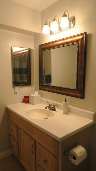 2nd bath is upgraded with new tub enclosure and framed mirror - 6111 Rancho Mission Rd