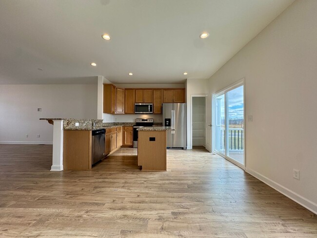 Building Photo - Modern 4 BR | 2.5 BA Townhome with Garage ...