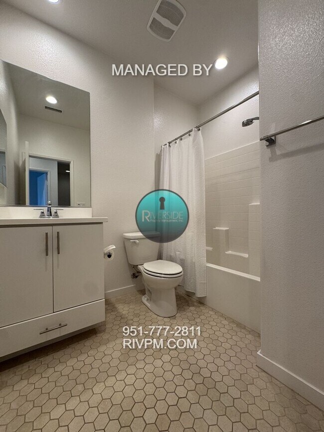 Building Photo - DISCOVER YOUR DREAM CONDO AT BEDFORD IN CORONA!!  SOLAR INCLUDED!