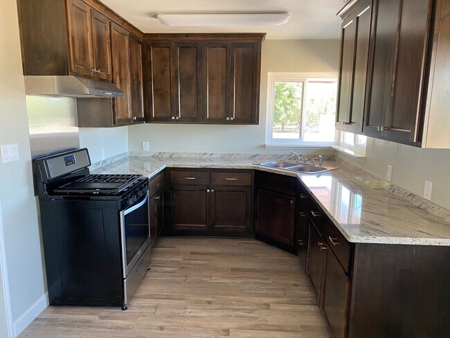 Primary Photo - A Welcoming 3-Bedroom with Outdoor Room to Breathe