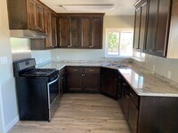 Building Photo - A Welcoming 3-Bedroom with Outdoor Room to Breathe