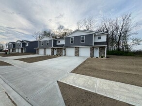 Building Photo - Brand-New 2 Bed / 1.5 Bath Townhome with Modern Finishes