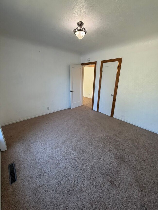 Building Photo - 2 Bedroom with a garage with Large fenced yard!