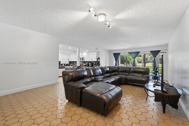 Building Photo - 7460 Woodmont Terrace