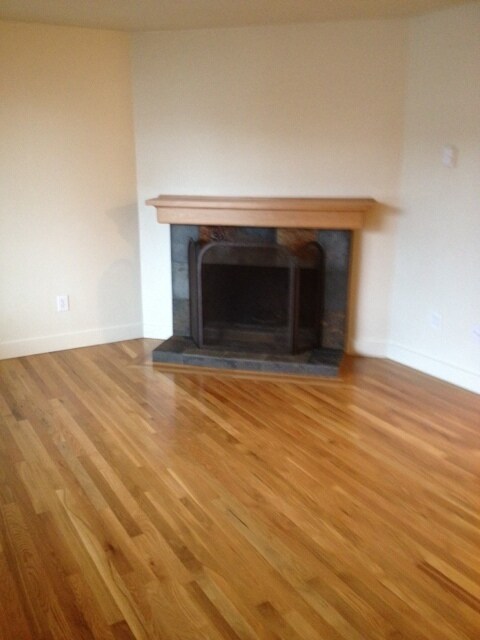 Building Photo - Full Remodeled Custom Fireplace,Hardwoods-...
