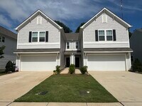 Building Photo - Three bedroom 2 1/2 bath townhome with att...