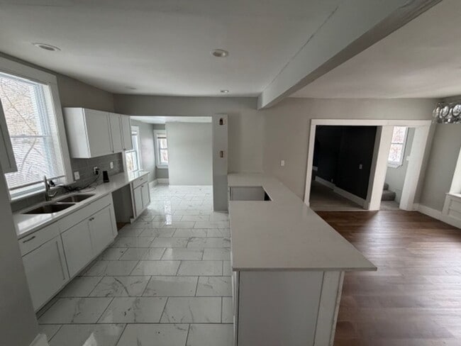 Building Photo - Charming 4-bed, 2-bath brick colonial home Contact KPM Detroit 313-429-3244