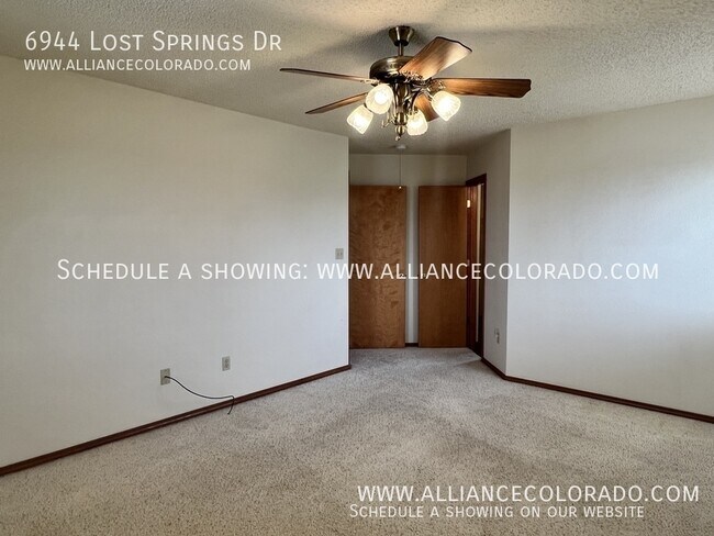 Building Photo - 6944 Lost Springs Dr