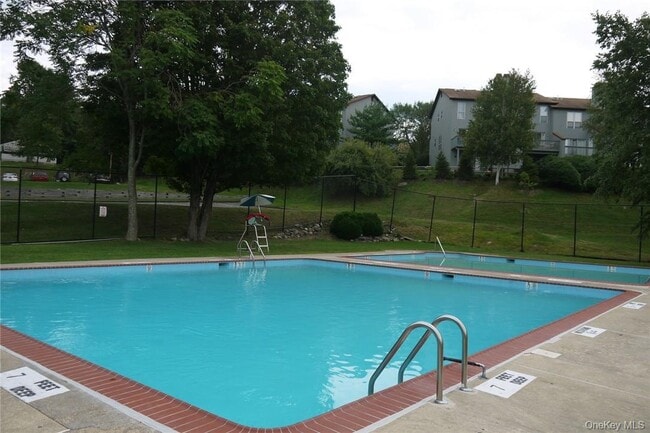 Building Photo - 5307 Villa at the Woods