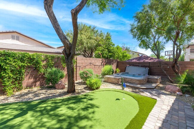 Building Photo - Spacious Mountain’s Edge Home with Den, Sunroom, 3-Car Garage & Private Spa Retreat