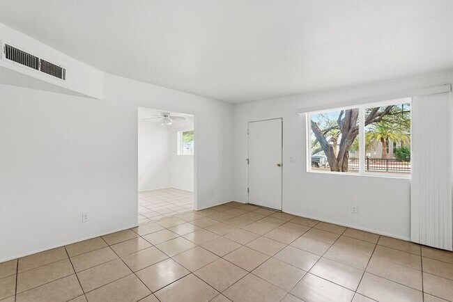 Building Photo - Bright 3-Bed Tucson Rental Home with Expansive Fenced Backyard Near U of A