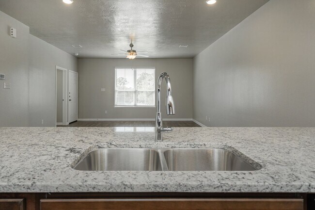 Building Photo - Live, love, and grow in this charming townhome!