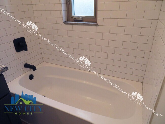 Building Photo - Newly Renovated Apartment Building