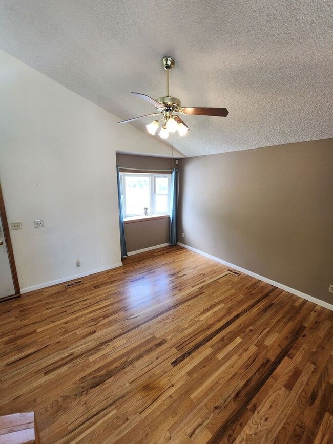 Building Photo - Spacious 4-Bedroom Home with RV Parking in...