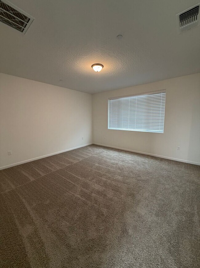 Building Photo - Spacious Brand New 4-Bedroom, 3-Bathroom Home with Solar & Low-Maintenance Yard