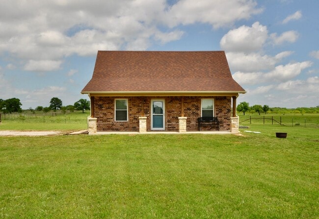 Building Photo - FOR LEASE! Enjoy Quiet Country Living in this Cute 2 BR - 1 BA Brick Home on 1 Acre in Millsap ISD.