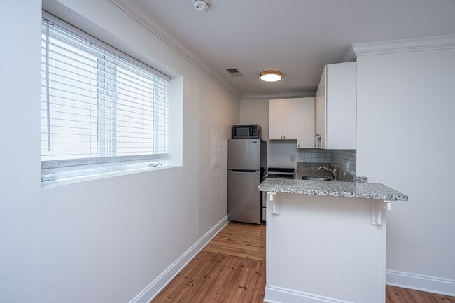 Building Photo - Historic Charm Meets Downtown Energy on King Street