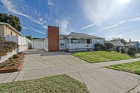 Building Photo - BRIGHT & AIRY, PARTIALLY REMODELED 2BR2BA ...