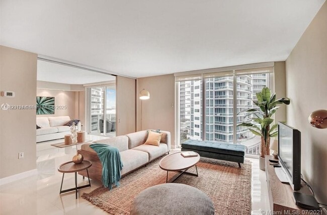Building Photo - 10275 Collins Ave
