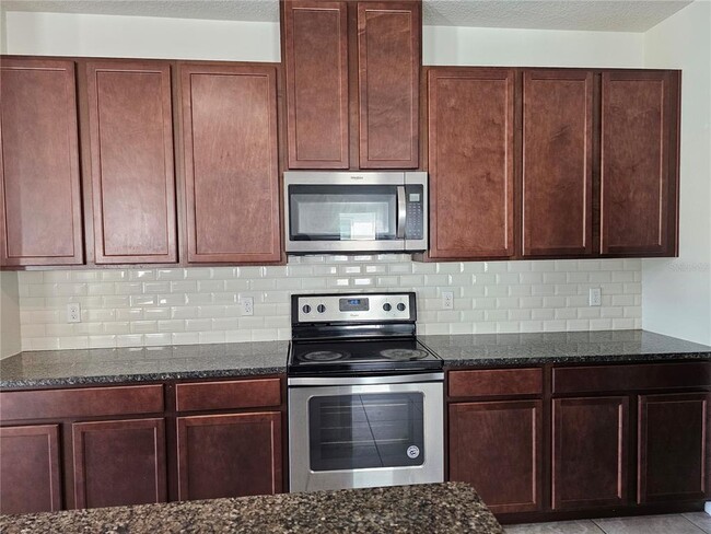 Building Photo - 4078 Pindo Palm Ln