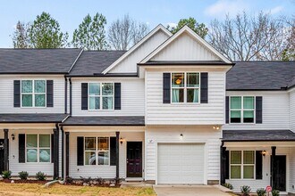 Building Photo - 4 Bedroom Townhouse for Rent in Clayton NC | Garage | Pet Friendly | Wooded View! | MOVE IN SPECI...