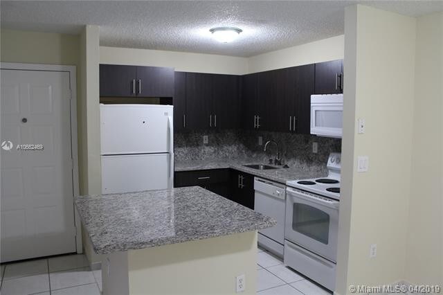 Building Photo - 4680 NW 102nd Ave  104-20