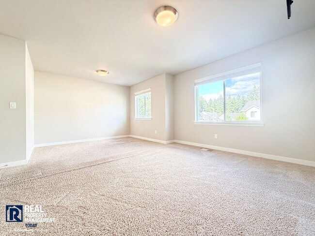 Building Photo - Modern 5-Bedroom Home with Mother-In-Law Suite & Covered Patio!