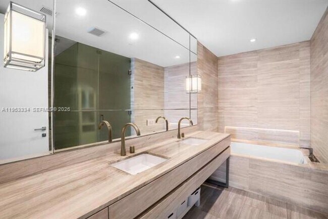 Building Photo - 18975 Collins Ave