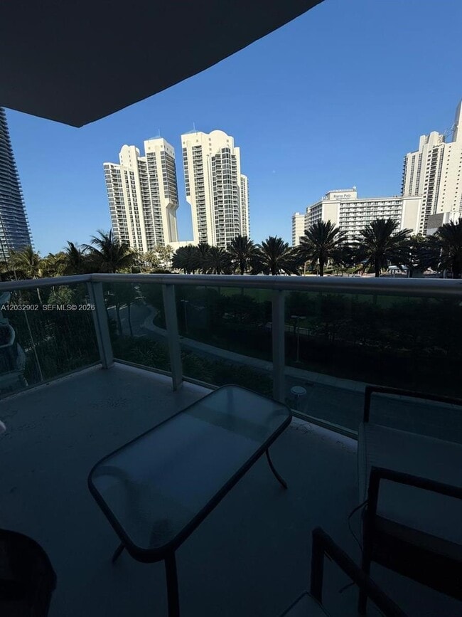 Building Photo - 19370 Collins Ave