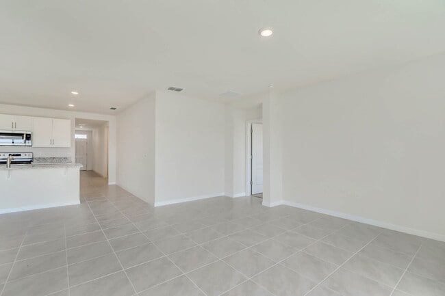 Building Photo - 4 bedrooms and 2 bathrooms, the spacious 1,828 sq ft home features an open concept with a 2 car g...