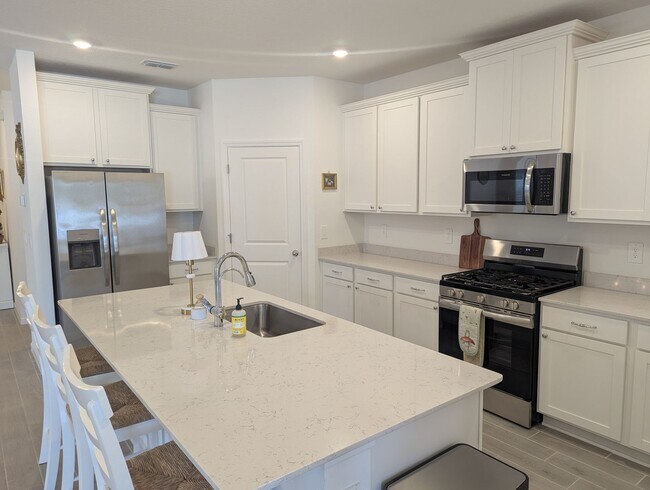 Building Photo - Beautiful newer-construction 4-bedroom, 3-bath home located in Trailhead Landing