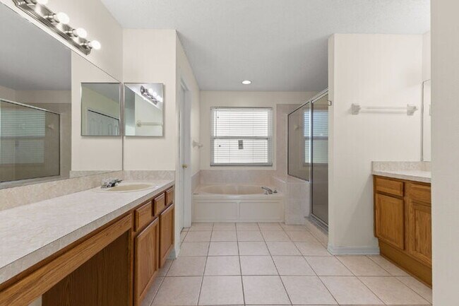 Building Photo - "Spacious 4-Bedroom Gem with 2.5 Baths in ...
