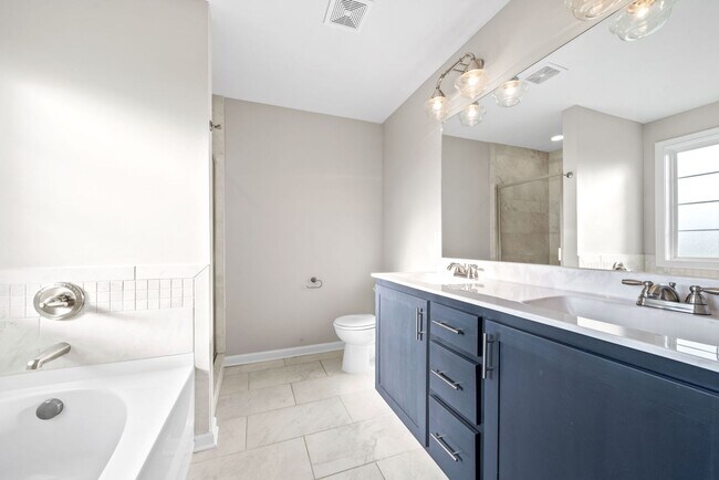 Building Photo - Pet Friendly Three Bedroom!