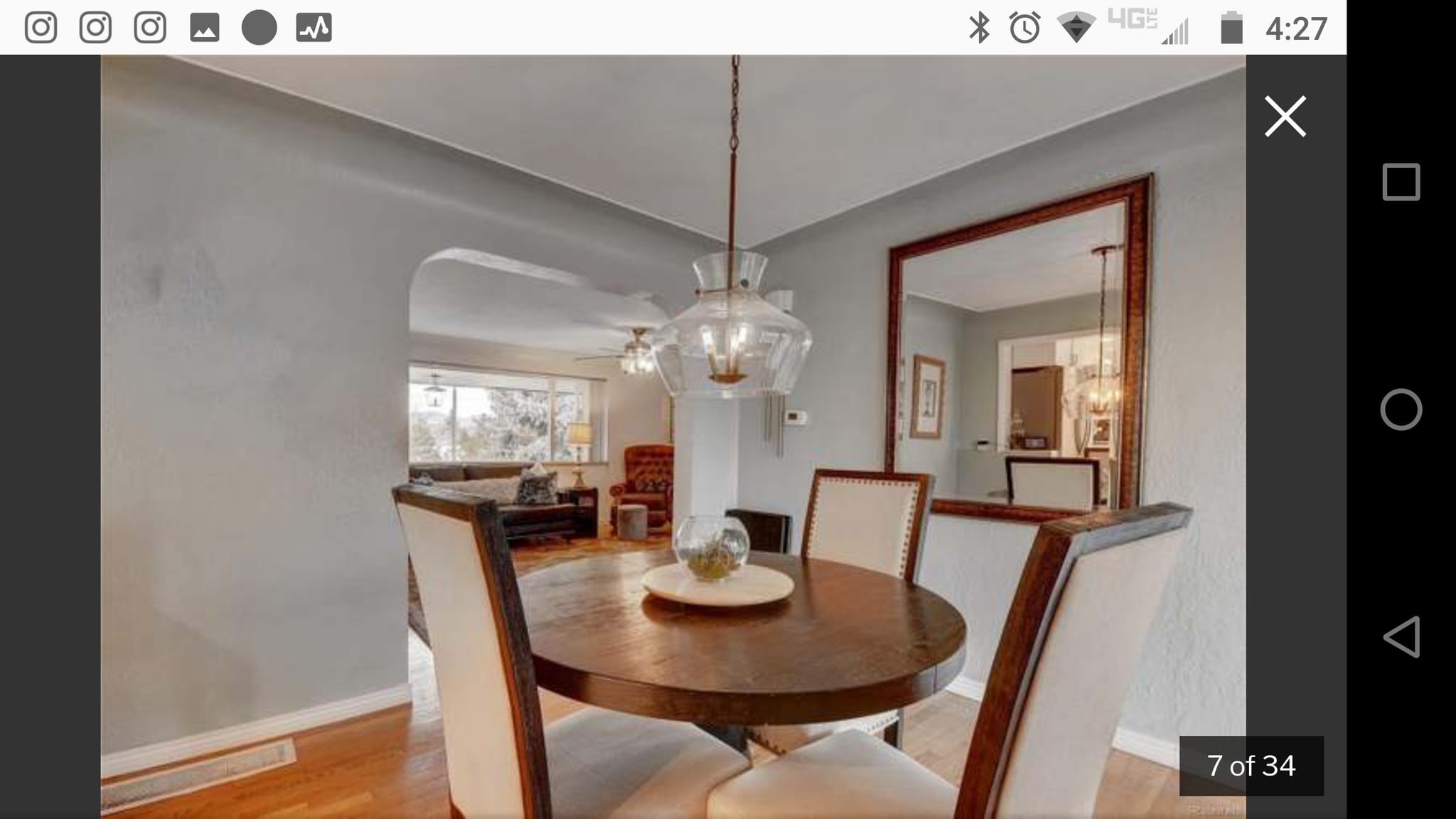 Large Dining Room with hardwood floors. - 1808A Simms St